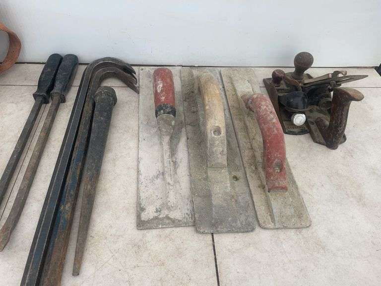 2 pair of Kunys kneeling pads, pair of goose necks, trowels, Stanley plane, shoulder strap