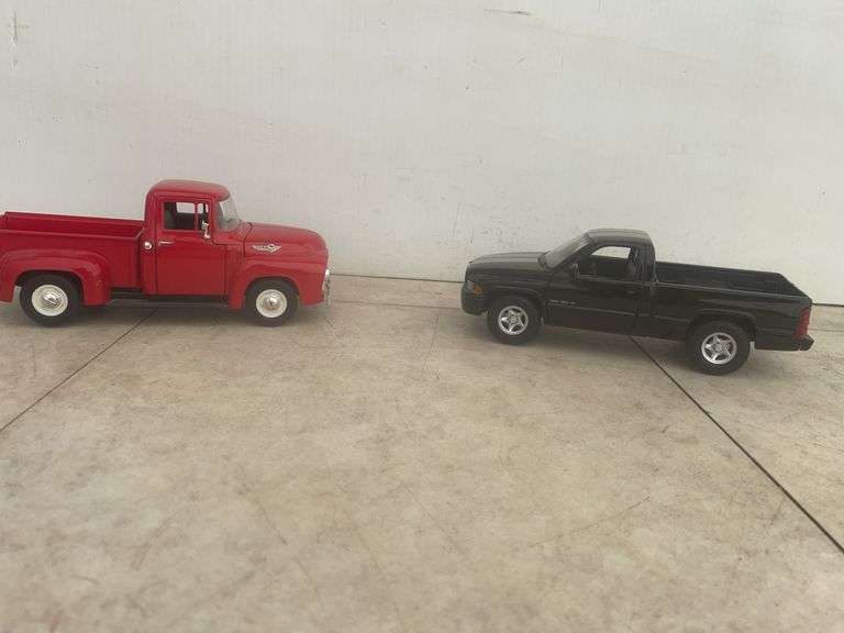 Collectable Ford and Dodge toy trucks , believed to be 1/24 scale