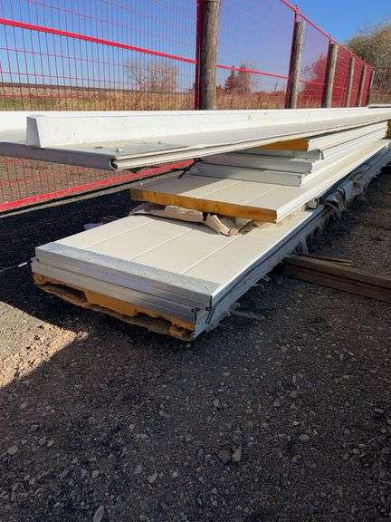 Qty of garage door panels various sizes & lengths (1 stack)