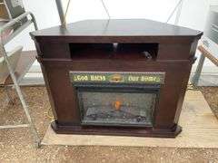 Nice working corner electric fireplace, measures 47"wide by 17"deep by 36 1/2" high