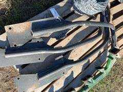 Roll of barbed wire, exhaust manifold for JD 4920 and fender brackets for same unit