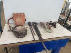 2 pair of Kunys kneeling pads, pair of goose necks, trowels, Stanley plane, shoulder strap