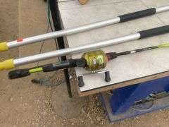 Pair of aluminum shoreline paddles, ax, fishing rod and reel