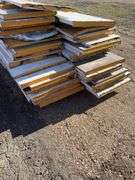 Large Qty of garage door panels various sizes & lengths (2 stacks)