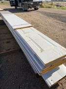 Qty of garage door panels various sizes & lengths (1 stack)