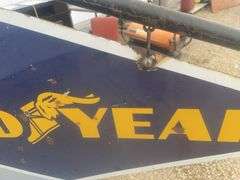 Double sided Goodyear sign, sign overall measures 40" x 20”, comes with a hanger stand