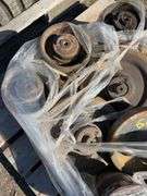 Pallet of Case 270 skidsteer bogey wheels & idlers - drive sprockets reversed once