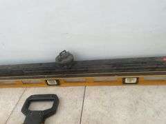 Pair of 4'levels - one comes in case, 330 foot measuring tape
