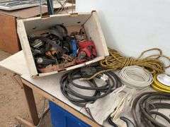 Pair of 14 foot heavy duty booster cables, quantity of new rope, miscellaneous ratchet straps, elect
