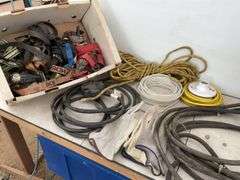 Pair of 14 foot heavy duty booster cables, quantity of new rope, miscellaneous ratchet straps, elect