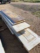 Qty of garage door panels various sizes & lengths (1 stack)