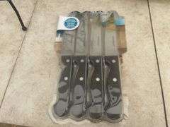 Unused 50' garden hose, ornamental iron plant stand, unused steak knives