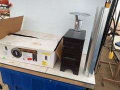 Nu-Way mini woodburning stove for ice shacks. Unused