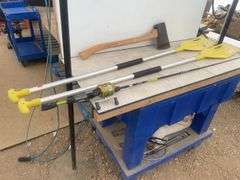 Pair of aluminum shoreline paddles, ax, fishing rod and reel