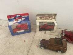 Miscellaneous toys including two mail trucks, couple motorbikes etc.