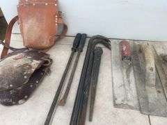 2 pair of Kunys kneeling pads, pair of goose necks, trowels, Stanley plane, shoulder strap