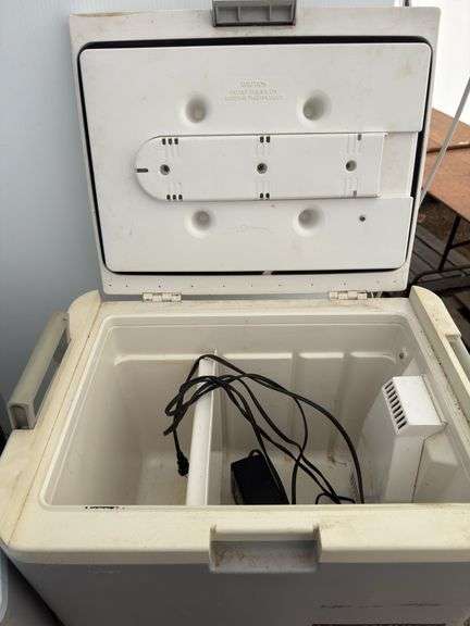 2 coolers - smaller one missing cord, condition unknown