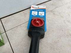 Unused wire terminal assortment, paint scraper, grease hoses, quantity of 2 1/2" rope pulleys etc