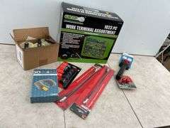 Unused wire terminal assortment, paint scraper, grease hoses, quantity of 2 1/2" rope pulleys etc