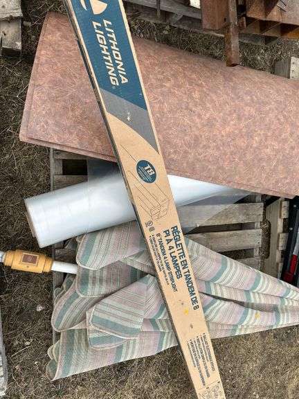 Pallet with arborite, patio umbrella, 8ft T8 light fixture, roll of poly