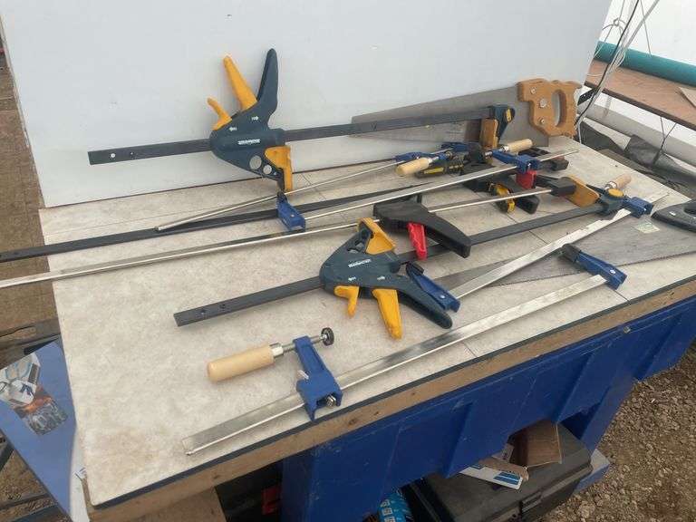 Quantity of clamps, pair of hand saws