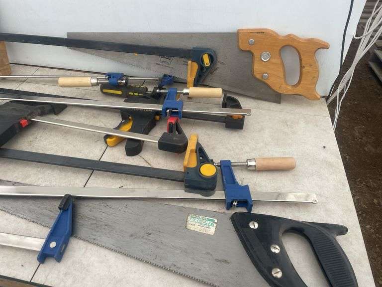 Quantity of clamps, pair of hand saws