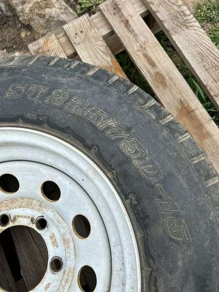 1 trailer tire on steel wheel - ST225/75D-15