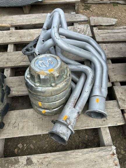 Ford 302 headers and 4 Dodge center caps