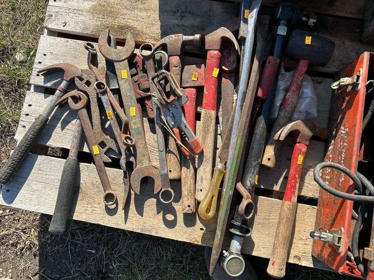 Pallet with misc hand tools and untested power tools