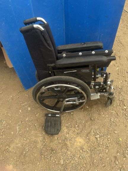 Kid size wheelchair only has one foot rest