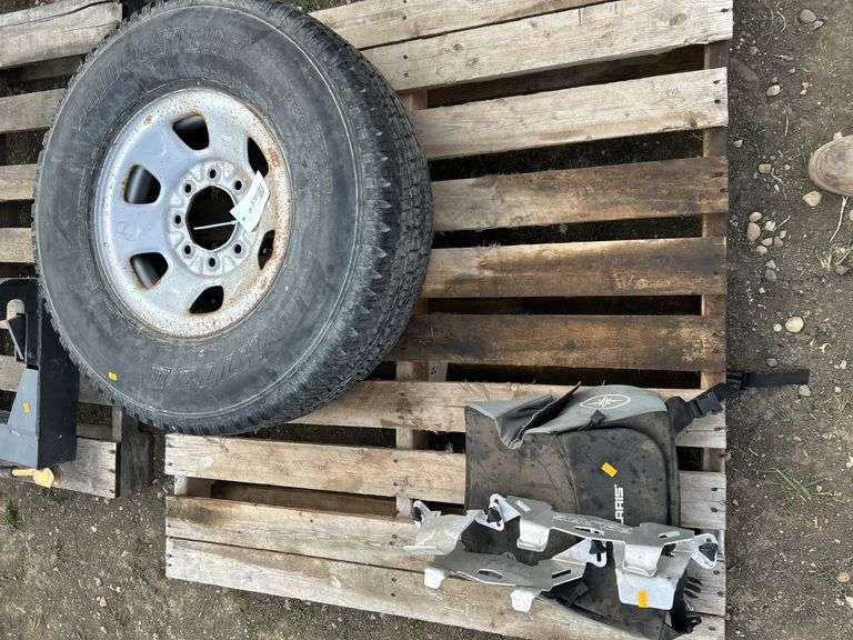 Bridgestone tire and rim -LT265/75R16 and Polaris bag