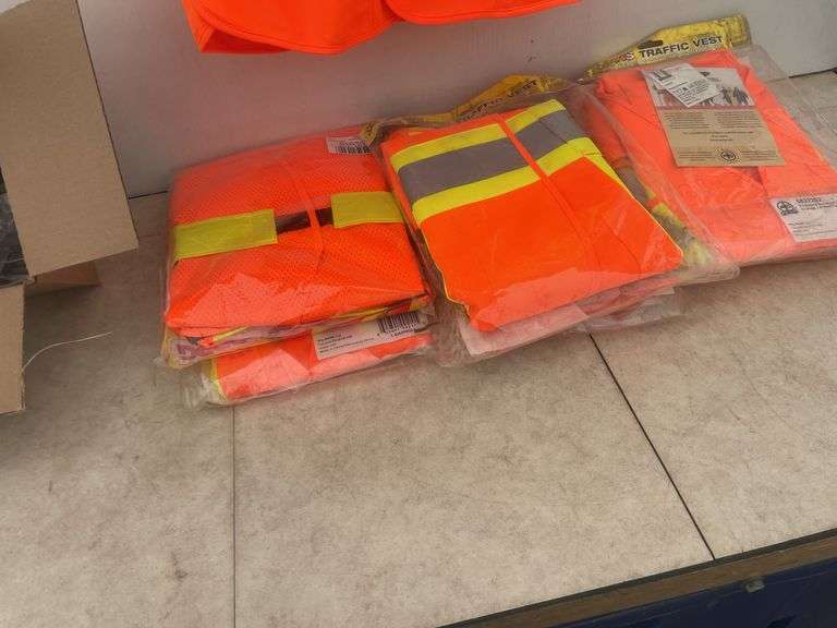 Approximately 30 facemasks and 7 safety vest