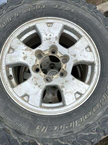 4 tires/rims off of Toyota is very poor condition- LT245/75R16