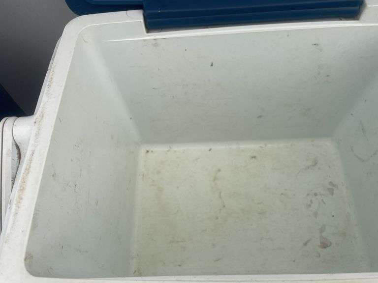 A pair of coolers and a size small life jacket