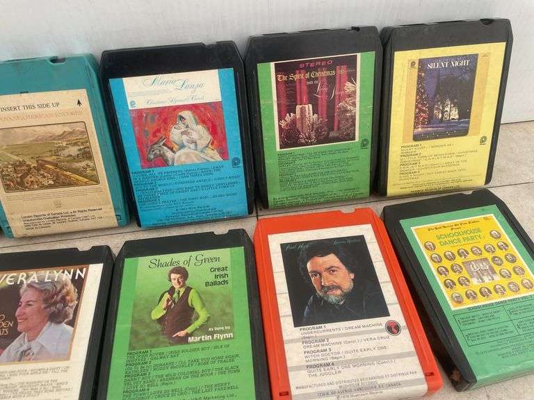 Quantity of 8 track tapes including cassette to 8 track adapter, head cleaner, Christmas music etc.