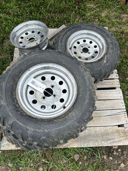 Kawasaki ATV 4 rims and 3 tires - 1 -25x10x12 & 2 -25x8x12