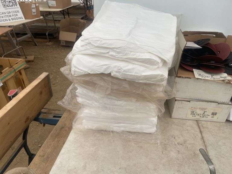 Quantity of L and XL painters coveralls, 2 boxes of nitro gloves, Loctite LB808, miscellaneous face 
