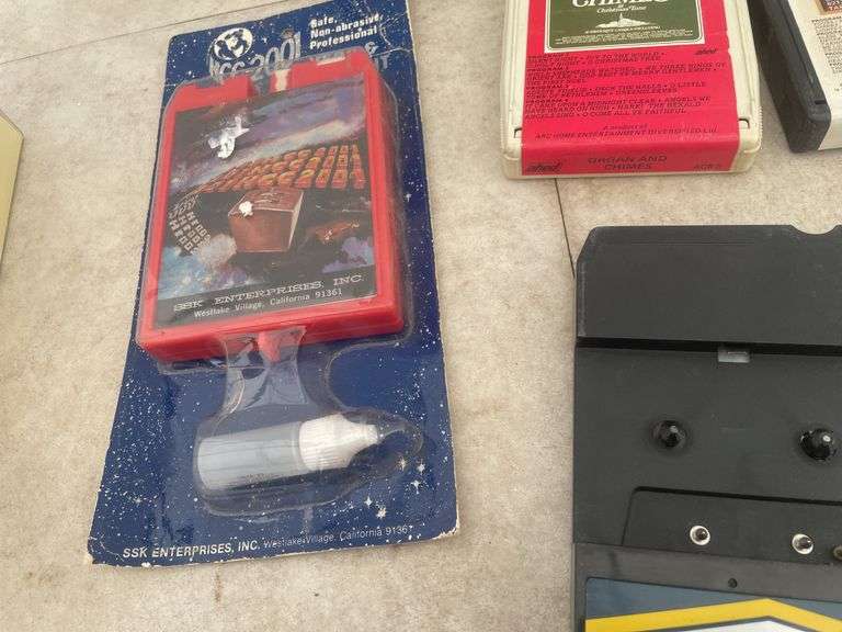 Quantity of 8 track tapes including cassette to 8 track adapter, head cleaner, Christmas music etc.