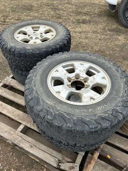 4 tires/rims off of Toyota is very poor condition- LT245/75R16