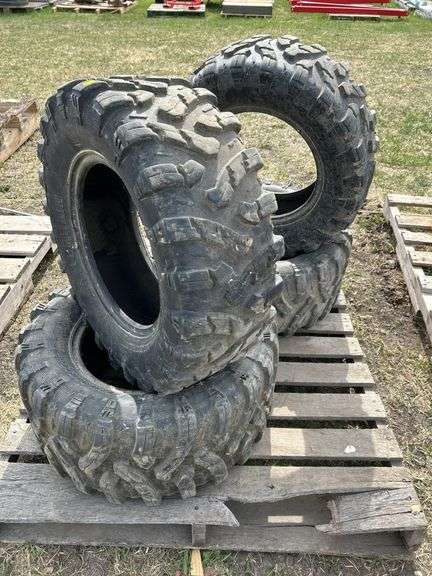 4 quad tires - 2- 27x9.00R14 and 2  - 27x11.00R14