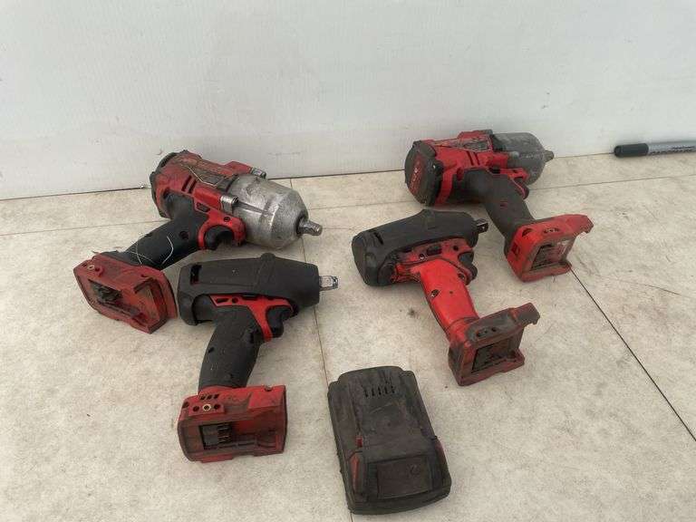 4 of 1/2" Milwaukee impacts (2 small models and 2 bigger models) comes with a battery - impacts all 