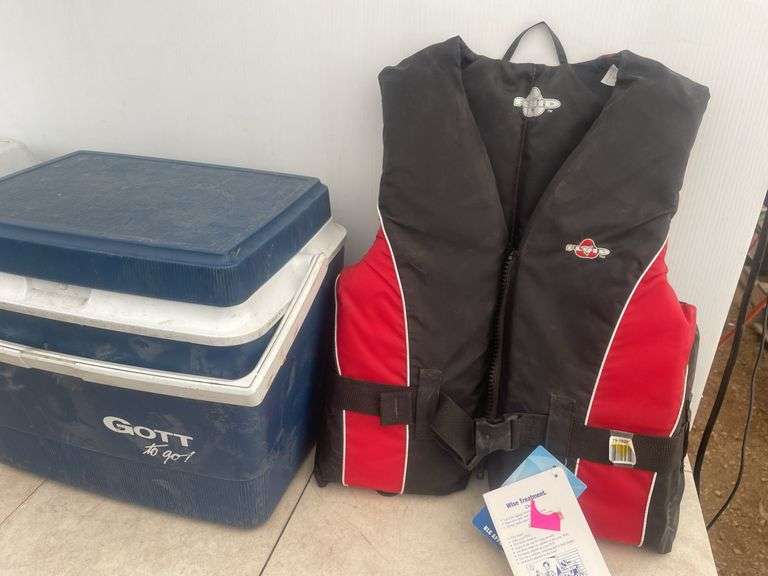 A pair of coolers and a size small life jacket