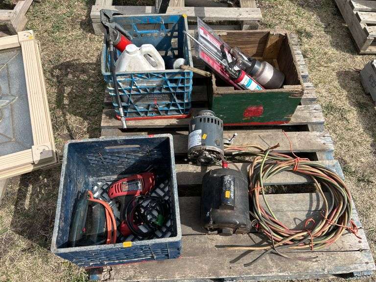 pallet with grease guns, power tools, bbq burner, electric motors