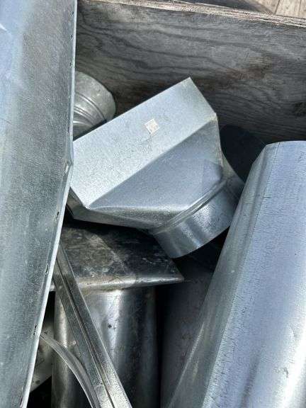 Crate of misc stove pipe and pieces