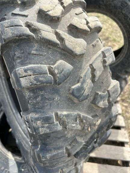 4 quad tires - 2- 27x9.00R14 and 2  - 27x11.00R14