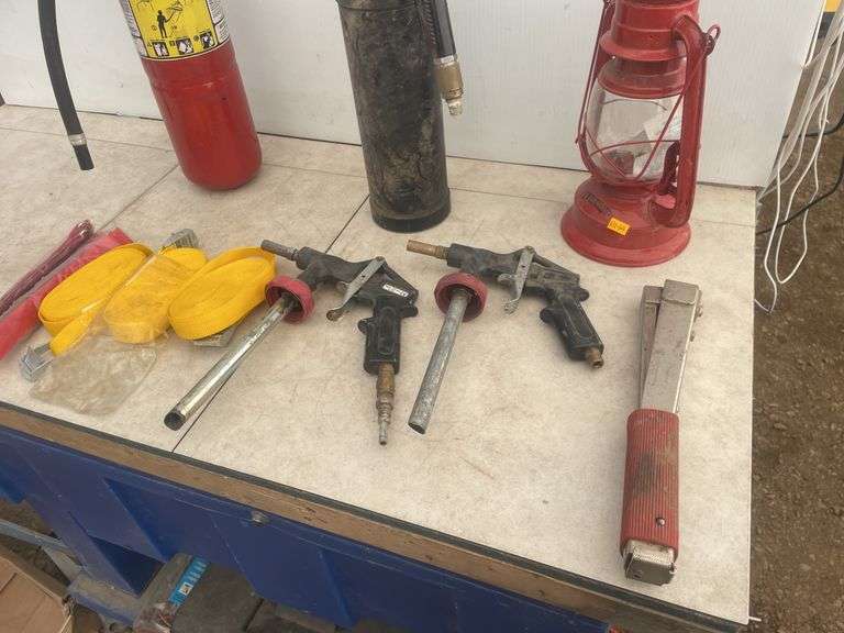 Fire extinguisher - needs charging, spot blaster, barn lantern, hammer stapler etc.