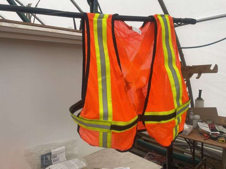 Three safety vests, flame retardant, pair of safety straps