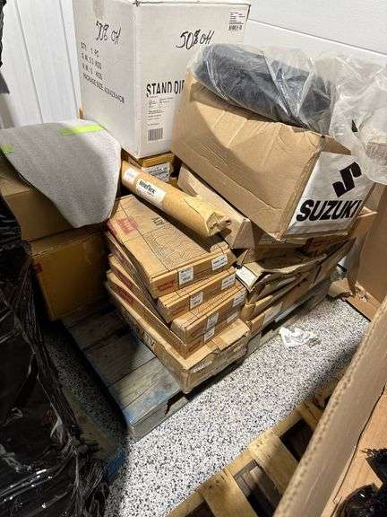 Pallet of misc Suzuki and Honda parts - Dealer total cost  $8300.00