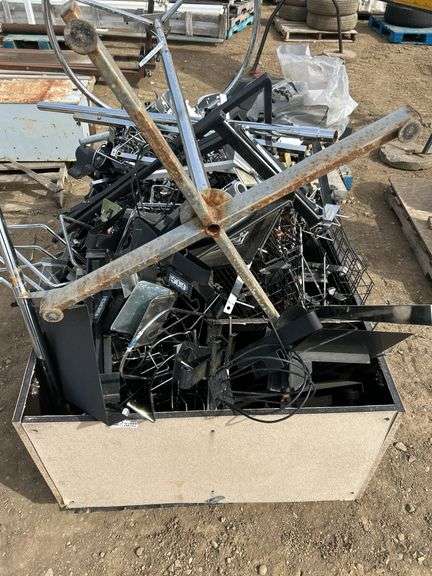 Crate of misc shelving hooks, sign holders etc.