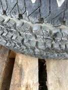 Bridgestone tire and rim -LT265/75R16 and Polaris bag